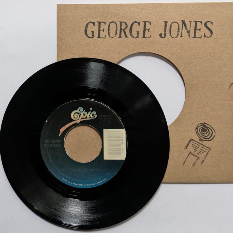 GEORGE JONES - I'M A ONE WOMAN MAN / PRETTY LITTLE LADY FROM BEAUMONT TEXAS (1988) VINIL 7"