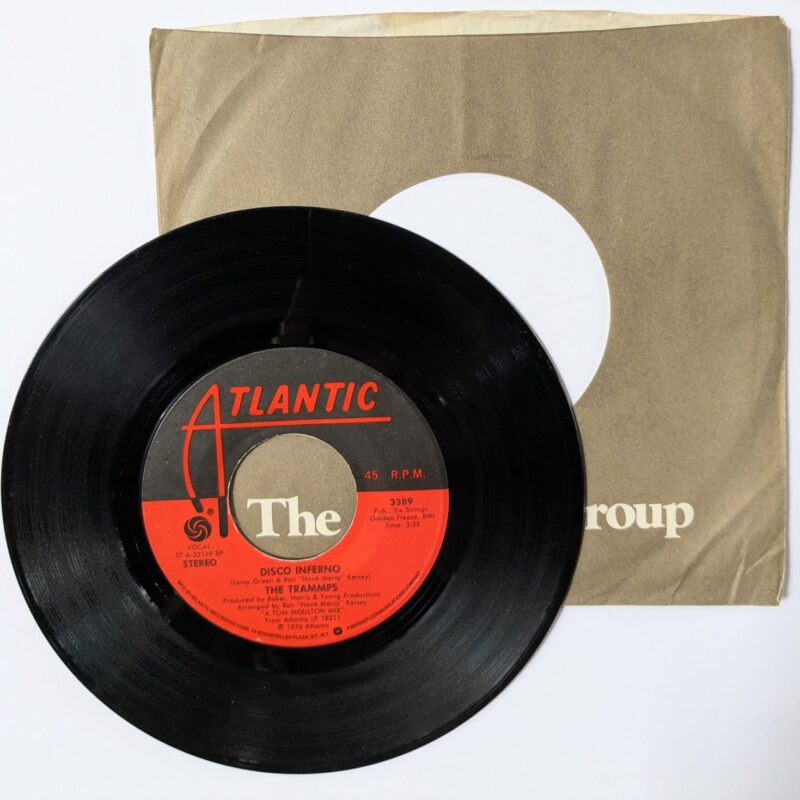 THE TRAMMPS / DISCO INFERNO / YOU TOUCH MY HOT LINE / 1977 / VINIL 7"