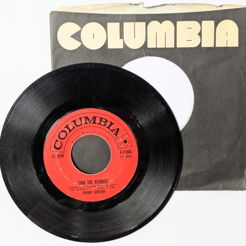 JOHNNY HORTON / SINK THE BISMARK / THE SAME OLD TALE THE CROW TOLD ME / 1960 / VINIL 7"